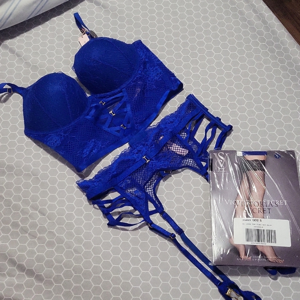 Victoria's Secret Bombshell blue corset bra with garter and fishnet stockings